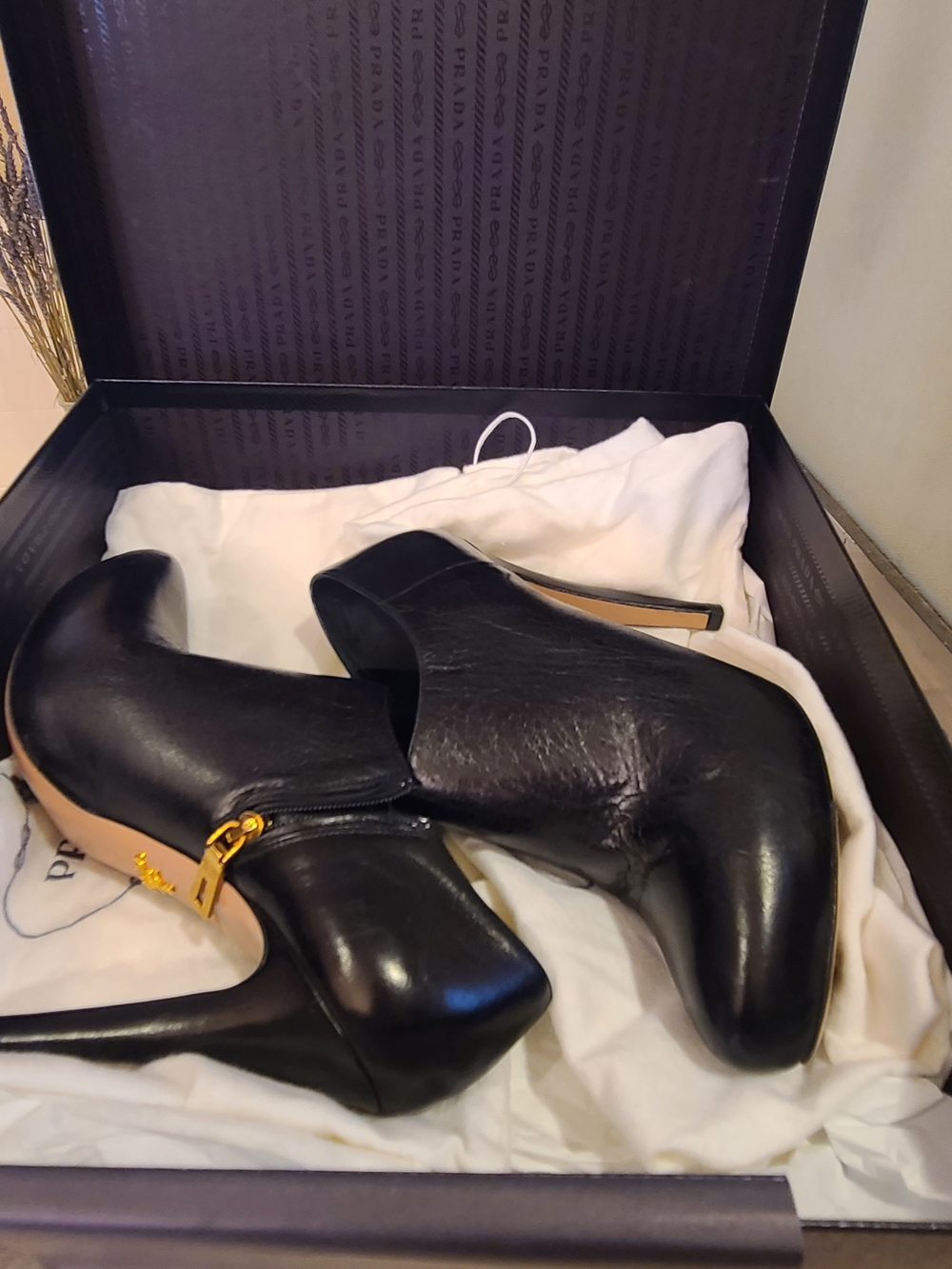 Prada Black Leather High Heel Ankle Booties with Gold Zip Accent